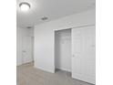 Bedroom with closet and grey carpet at 3182 Viceroy Ct, Poinciana, FL 34759