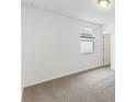 Spacious bedroom with neutral walls, carpet flooring, and a window at 3174 Viceroy Ct, Poinciana, FL 34759
