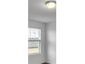 Bright bedroom with window blinds and neutral walls at 3793 Bluethread Way, Poinciana, FL 34759