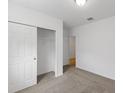 Bedroom with double door closet and carpet at 3170 Viceroy Ct, Poinciana, FL 34759