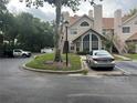 Townhome exterior with landscaping and parking at 575 Bloomington Ct # 27, Altamonte Springs, FL 32714