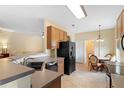 Kitchen boasts a breakfast nook and modern appliances at 3216 Lynrock Ave, Dundee, FL 33838