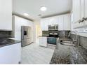 Modern kitchen with granite countertops at 700 Eldridge St, Orlando, FL 32803