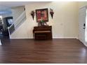 Spacious living room with hardwood floors and piano at 3635 Daydream Pl, Saint Cloud, FL 34772