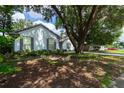 House exterior showcasing landscaping and driveway at 5525 Barma St, Orlando, FL 32807