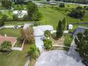 Aerial view of a single Gathering home in a residential neighborhood at 15901 Greater Groves Blvd, Clermont, FL 34714