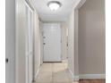 Bright entryway with tile floors and built-in storage at 4803 S Texas Ave # B, Orlando, FL 32839