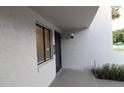 Condo entry with private door and window at 8 Escondido Cir # 79, Altamonte Springs, FL 32701