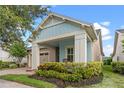 House exterior with light blue accents and landscaping at 4907 W Fountainwood Dr, Saint Cloud, FL 34772