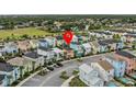 Aerial view showing location of the house in a neighborhood at 8027 Knee Deep Rd, Kissimmee, FL 34747