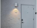 Unit 35 entrance with keyless entry at 5303 S Atlantic Ave # 35, New Smyrna Beach, FL 32169