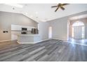 Modern kitchen with island and stainless steel appliances at 7304 High Lake Dr, Orlando, FL 32818