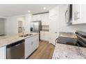 Modern kitchen with stainless steel appliances and island at 2342 White Tail St, Davenport, FL 33837