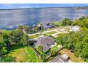Lakefront property with backyard oasis and circular driveway at 238 E Lakeshore Dr, Clermont, FL 34711