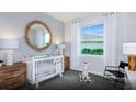 Bright Bedroom with crib, rocking chair, and ample natural light at 3086 Norcott Dr, Davenport, FL 33837