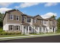Modern townhome community with attractive exteriors at 15871 Tollington Aly, Winter Garden, FL 34787