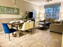 Open concept living and dining area with modern decor at 4814 Cayview Ave # 21013, Orlando, FL 32819