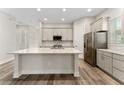 Modern kitchen with stainless steel appliances at 14663 Englert Aly, Orlando, FL 32827