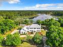 Two-story house with lake view, spacious yard, and detached garage at 226 Mitnik Dr, Deltona, FL 32738