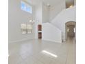 Spacious dining room with high ceilings and tile floors at 8039 Northlake Pkwy, Orlando, FL 32827