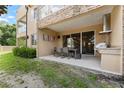 Private patio with seating area and built-in grill at 3175 Brasilia Ave, Kissimmee, FL 34747