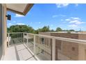 Modern balcony with glass railings and city views at 3175 Brasilia Ave, Kissimmee, FL 34747