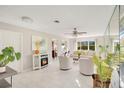 Spacious living room with fireplace and plenty of natural light at 899 Jonathan Way # 899, Altamonte Springs, FL 32701