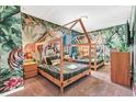 Fun ' room with twin beds and jungle theme at 4738 Terrasonesta Dr, Davenport, FL 33837