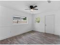 Spacious bedroom with gray flooring and white walls at 1039 S Central Ave, Lakeland, FL 33815