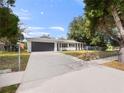 Ranch style home with modern updates and a large front yard at 5400 Fox Briar Trl, Orlando, FL 32808