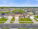 Two-story house in a neighborhood with a pond at 1139 August Sky Dr, Deltona, FL 32738