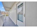 Inviting hallway with access to condo unit at 4831 Saxon Dr # 2270, New Smyrna Beach, FL 32169