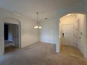 Bright dining room with entryway and access to other rooms at 11434 Jasper Kay Ter # 306, Windermere, FL 34786