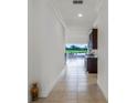 Bright hallway with view of backyard and patio at 2717 Greenlands St, St Cloud, FL 34772