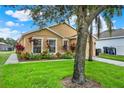 One-story house with a landscaped yard and driveway at 188 Ridgemont Ct, Davenport, FL 33896