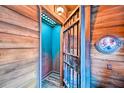 Nautical-themed bathroom with porthole and jail cell door at 8988 Stinger Dr, Champions Gate, FL 33896