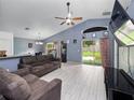 Spacious living room with tile floors and sliding doors at 9920 4Th Ave, Orlando, FL 32824