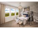 Fun bunk bed ' bedroom with beach theme decor at 2944 Scout Street, Saint Cloud, FL 34771
