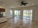 Breakfast nook with tile floor and sliding glass doors leading to a patio at 7465 Excitement Dr, Reunion, FL 34747