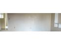 Spacious living room with light walls and hardwood floors at 1106 N Hoagland Blvd, Kissimmee, FL 34741