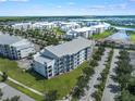 Luxury community featuring upscale apartments and a tranquil lake at 4751 Clock Tower Dr # 105, Kissimmee, FL 34746