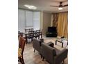 Open living and dining area with modern furnishings at 13427 Blue Heron Beach Dr # 501, Orlando, FL 32821