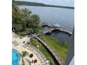 View of the community boat dock and waterfront at 13427 Blue Heron Beach Dr # 501, Orlando, FL 32821