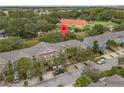 Aerial view of townhouses with community location pin at 2332 Caravelle Cir, Kissimmee, FL 34746