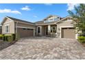 Spacious home with a large driveway and two car garage at 14895 Winkfield Ct, Winter Garden, FL 34787