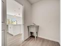 Bright laundry room with a utility sink and modern flooring at 1308 Hillsborough Ct, Kissimmee, FL 34759