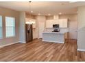 Spacious dining room with wood floors and lots of natural light at 15102 Stuttgart Aly, Winter Garden, FL 34787