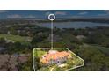 Luxury estate home situated on a large lot with lake views at 5174 Vardon Dr, Windermere, FL 34786