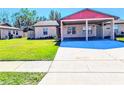 Charming single-story home with carport and spacious yard at 7534 Golden Glenn Dr, Orlando, FL 32807