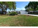 Single-Gathering home with a three-car garage and large yard at 2717 Bayview Dr, Eustis, FL 32726